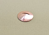Disc guitar pick stand rocking out in copper