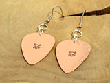 Guitar pick earrings with skulls and crossbones in hammered copper