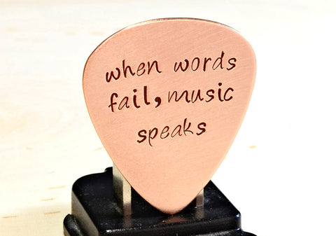 Copper Guitar Pick Handmade and Stamped with When Words Fail Music Speaks