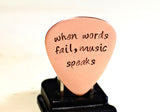 Copper Guitar Pick Handmade and Stamped with When Words Fail Music Speaks