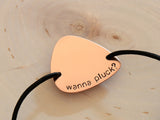 Copper guitar pick leather wrap bracelet stamped with Wanna Pluck