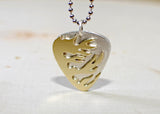 Sterling silver flaming guitar pick necklace handmade with blazing brass