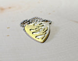 Sterling silver flaming guitar pick necklace handmade with blazing brass