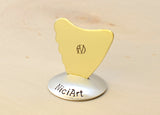 Brass Shark Fin Guitar Pick for the Serious Guitarist