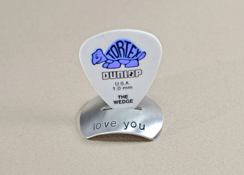 Aluminum guitar pick stand with added love