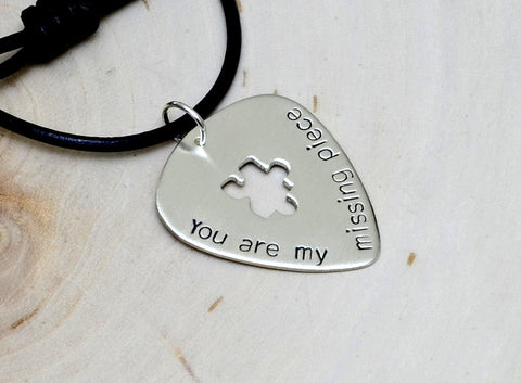 You are my missing piece sterling silver guitar pick necklace with a puzzle cut out