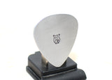 Guitar pick stamped in aluminum with an Owl