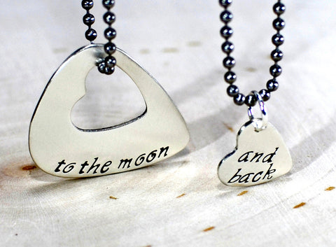 Couples sterling silver guitar pick necklace with heart for love to the moon and back