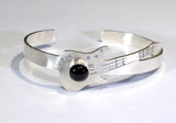Sterling silver guitar bracelet with musical inspiration and black onyx gemstone