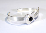Sterling silver guitar bracelet with musical inspiration and black onyx gemstone