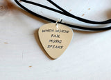 Sterling Silver Guitar Pick Necklace Handmade and stamped with When Words Fail Music Speaks