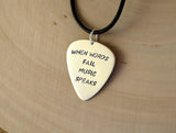 Sterling Silver Guitar Pick Necklace Handmade and stamped with When Words Fail Music Speaks