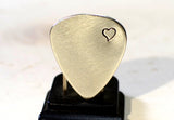 Sterling silver guitar pick brimming with love and a heart