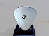 Sterling silver OM guitar pick for rocking out your inner zen