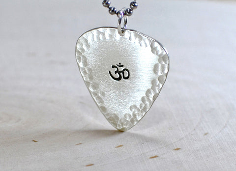 Sterling silver Om guitar pick pendant with hammered borders