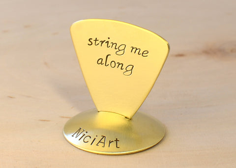 String me Along Triangular Brass Guitar Pick