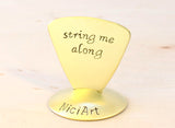 String me Along Triangular Brass Guitar Pick