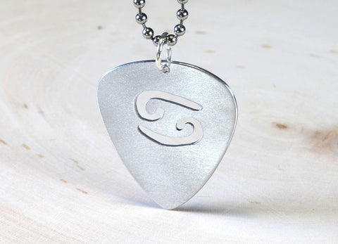 Zodiac guitar pick pendant in aluminum with personalized horoscope sign